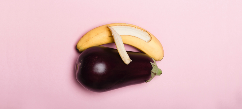 A Banana and Eggplant in a sexually suggestive position
