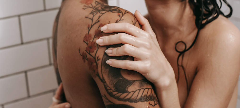 A couple embracing in the shower